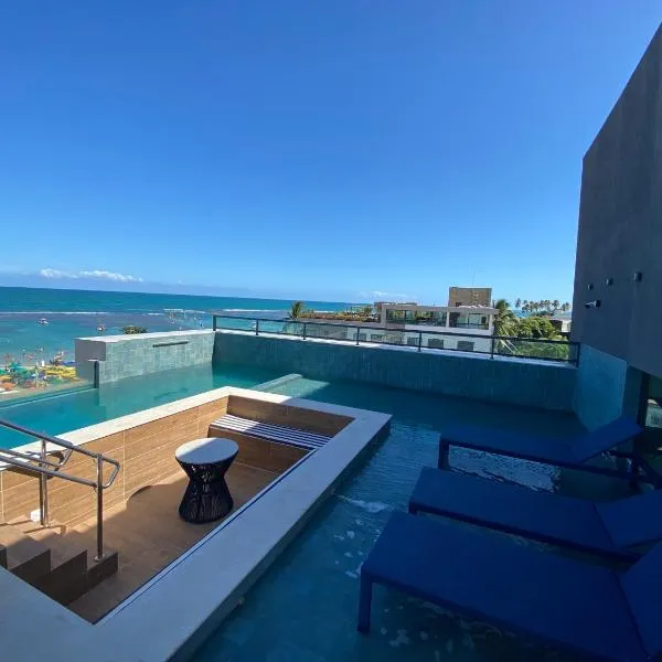 Flat à Beira Mar Com Varanda e Piscinas Naturais 308, hotel em Ipojuca