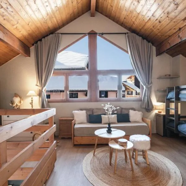 Le Chalerick - triplex rénové 6 à 8 personnes - hyper centre Valmeinier 1800 - ski aux pieds，位于瓦尔梅尼耶的酒店