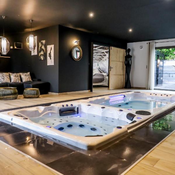 Au domaine des anges Gites avec Jacuzzi privatif dans la chambre