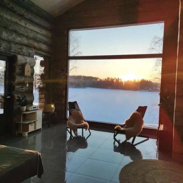 Upea kelohirsihuvila rannalla, myös poreamme!, hotel en Joensuu