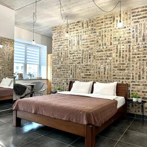 Designer apartments with a coffee machine in the city center, ξενοδοχείο σε Ρίβνε