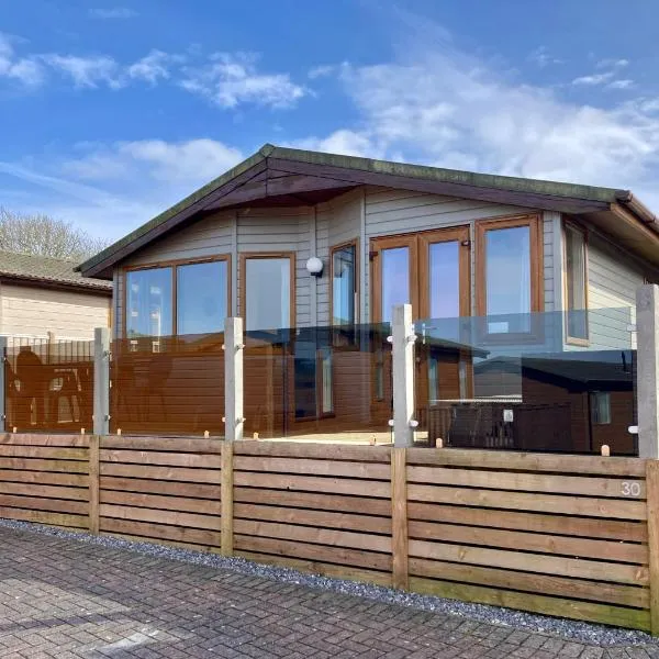 Beautiful 3-bed Coastal Lodge、West Downのホテル