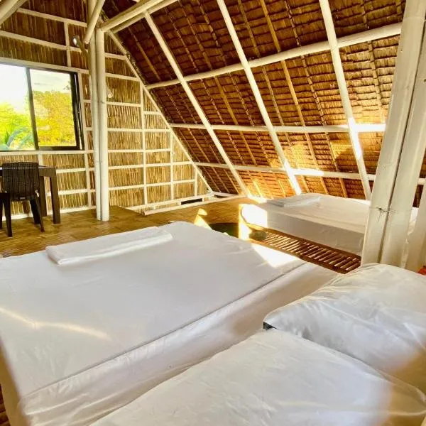 Villa Eliza Ecofarm, hotel in Tibiao