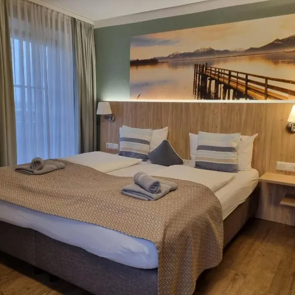 Gasthof Chiemseefischer, hotel v destinaci Grabenstätt