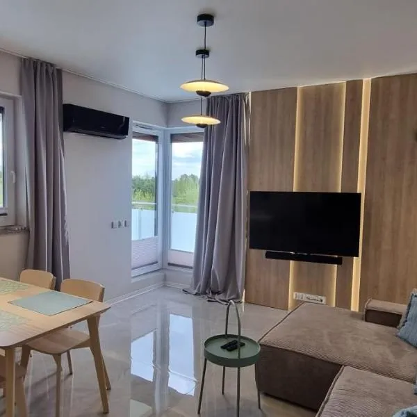 62m2 Apartament PREMIUM Łąki i Pola, ELEKTRYCZNE ROLETY, KLIMATYZACJA, GARAŻ, ŁADOWARKA AUT ELEKTRYCZNYCH, hotel in Suwałki