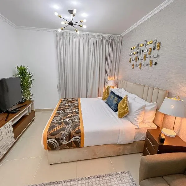 Cosmos Living Luxurious Studio Near Metro, hotel in Dubai