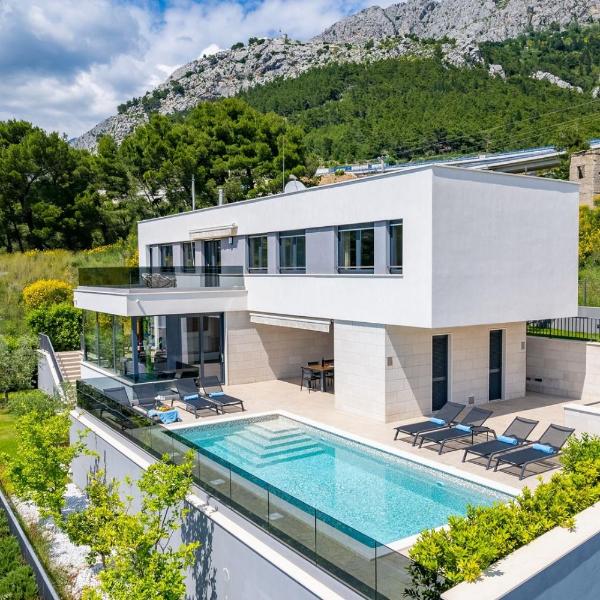 Luxury, seafront Villa IVAN with heated pool only 100m from beach