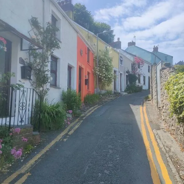 Fishermen's cottage with log burner, 2 bathrooms & sea views from garden terraces, hotel in The Mumbles