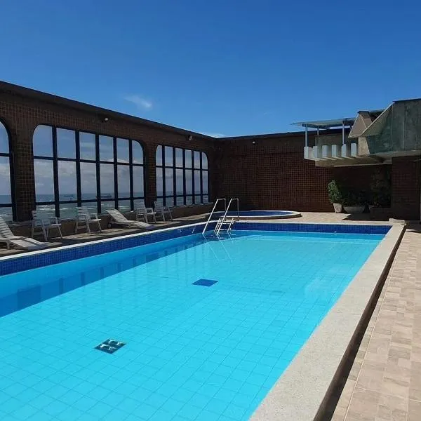 Recanto Maravista apto Frente Mar 2 quartos 2 banheiros, AR, WI FI, Piscina, hotel en Vila Velha