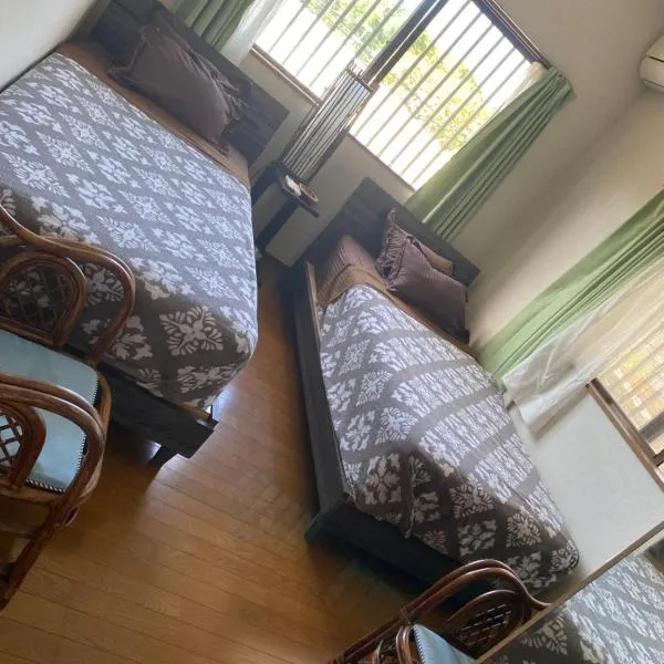 Sun Sea GuestHouse, hôtel à Yomitan