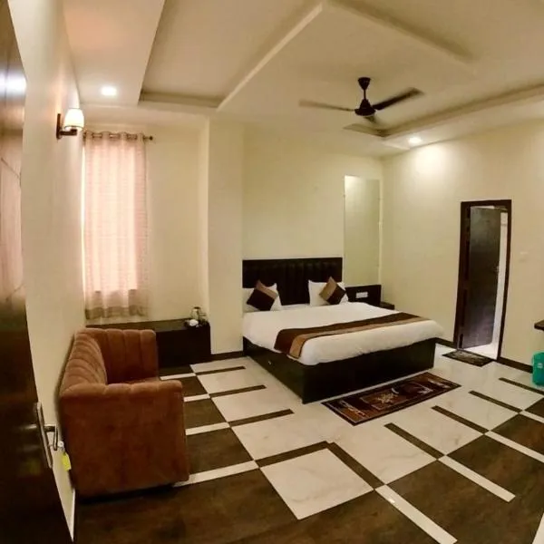 Hotel Govindam Elite, hotell i Juhi Bari