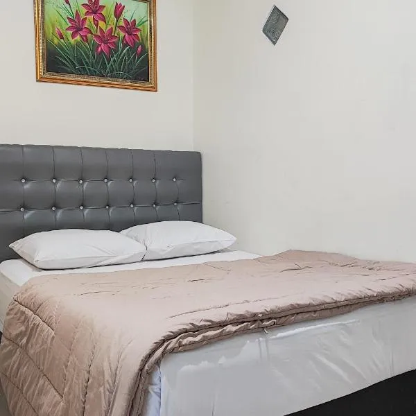 RedDoorz Syariah @ Penginapan Citra Alam 2, hotel in Sungaitutung