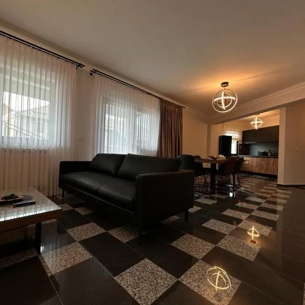 Apartament Adela Giulia、Buzăuのホテル