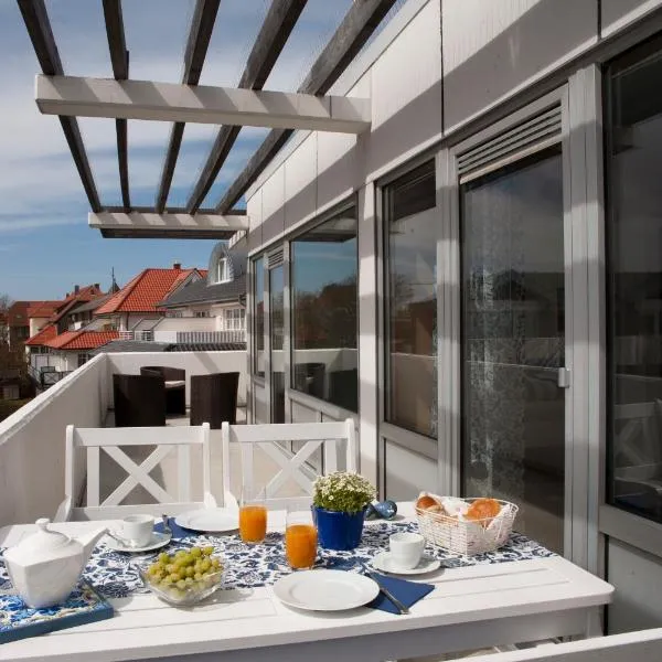 Lichtdurchflutete Ferienwohnung mit Südbalkon, hotel in Wangerooge
