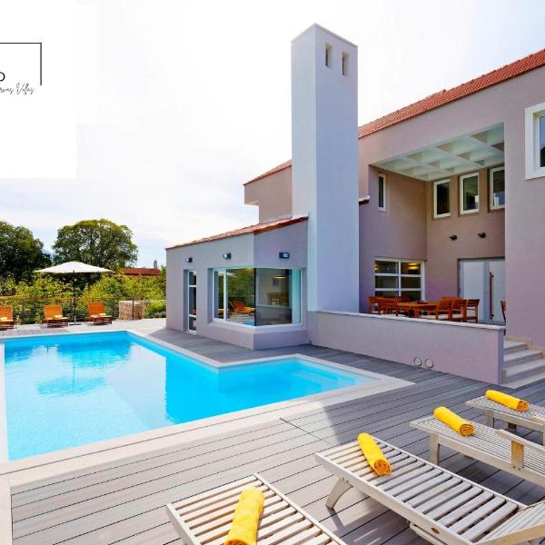 Villa Jure with upscale furnishings and a great garden, quiet location