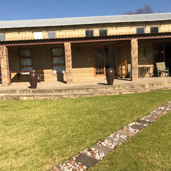 De Sandsteen Gastehuis, hotel en Warden