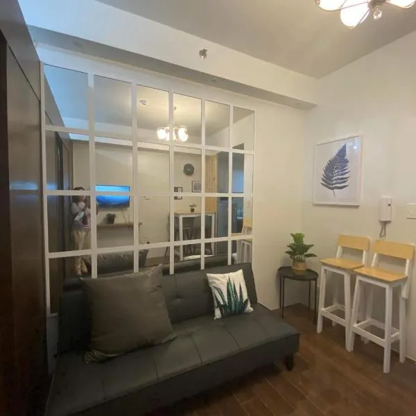 Homey 1-bedroom condo at the center of Makati, hotel Manilában