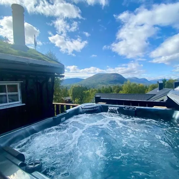 Three bedroom holiday house with jacuzzi in Bjorli , pets allowed, ξενοδοχείο σε Bjorli