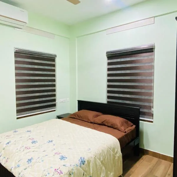 AL-Kabeer budget AC rooms，位于特里凡得琅的酒店