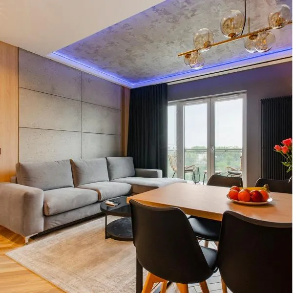 SKY Home- Wood Penthouse -Manufaktura, Parking, Klimatyzacja, Dostęp na Kod, Hotel in Łódź