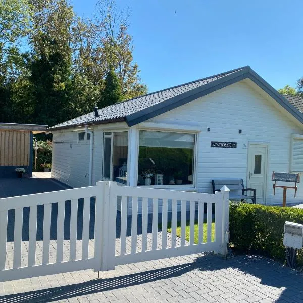 Bungalow Scheldezicht in Zeeland dicht bij zee、Scherpenisseのホテル