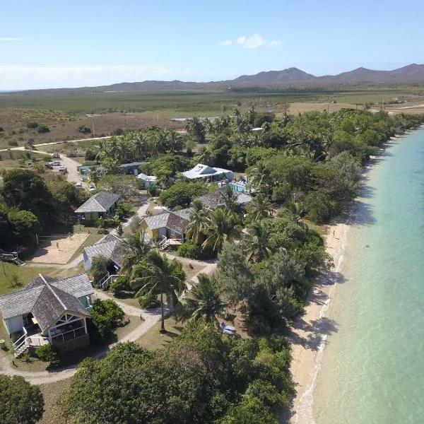 Beach House Lodge, hotel di Poum