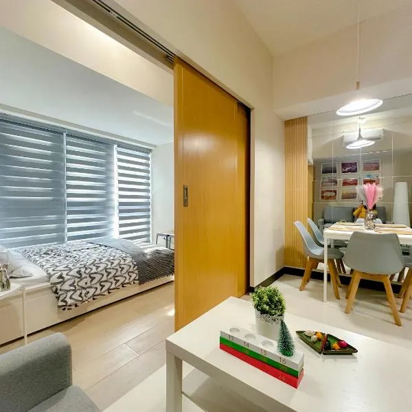 1BR BGC Uptown Modern Condo Netflix 200Mb Wifi, hotel in Manila