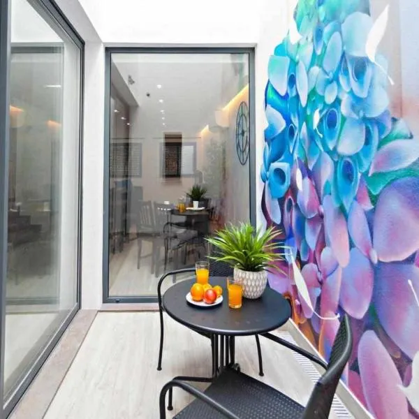 Faro Clara Suites, hotel em Faro