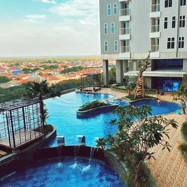 Cozy Apartment on Top of Pakuwon City Mall, hotel i Surabaya