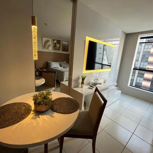 Suíte luxo com tela de cinema no América Towers Studio Residence, hotel em Salvador