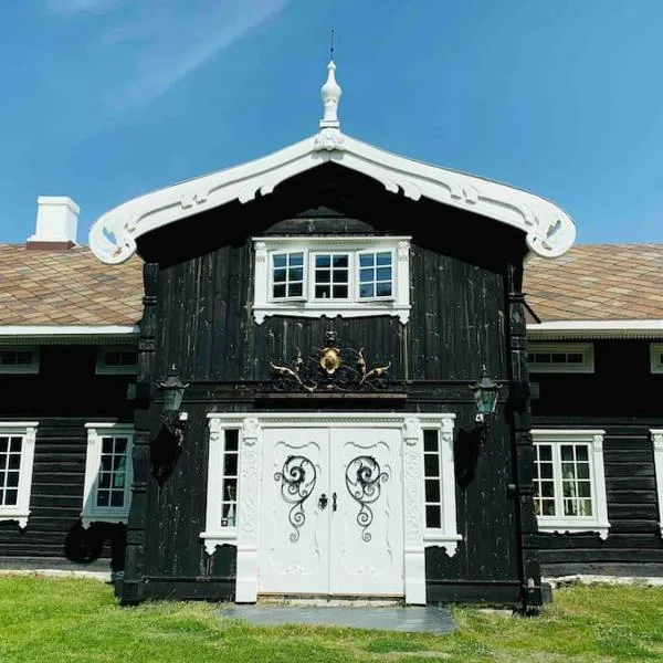 Eventyrlig Tømmerhytte på Gårdstun, hotel v destinaci Vinstra