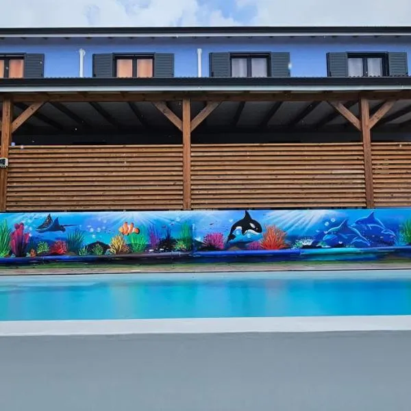 LES GITES D'ANGELE- Gîtes calme avec piscine, vue sur mer & jardin tropical, hotel em Vieux-Habitants