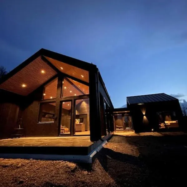 Nybygget arkitekt tegnet Snøhetta i vakker natur、Sandのホテル