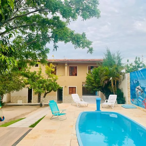 Happy Hostel e Pousada Paracuru, hotel in Paracuru