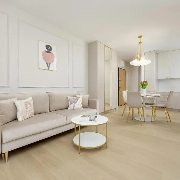Stylish Apartment with Balcony 7th Floor by Noclegi Renters, hotel in Warsaw