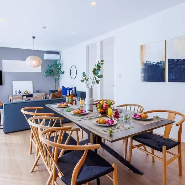 美ら海水族館まで車で7分 新築 ベルビーチゴルフクラブ近く 最大人数12名 Mitsuru-本部, hotel in Motobu