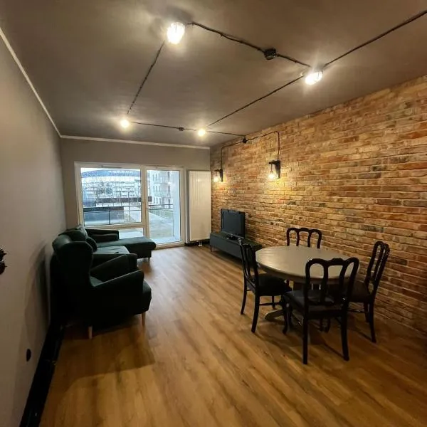 APARTAMENT z widokiem na stadion Styl Industrialny Jedyny taki CHECK IN 24 H, hotel v Poznani