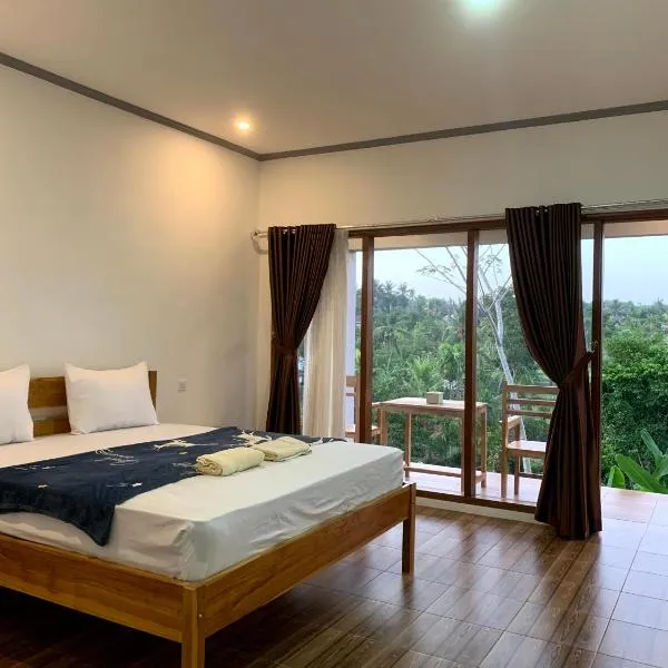 Tommy Homestay, hotel in Plambi
