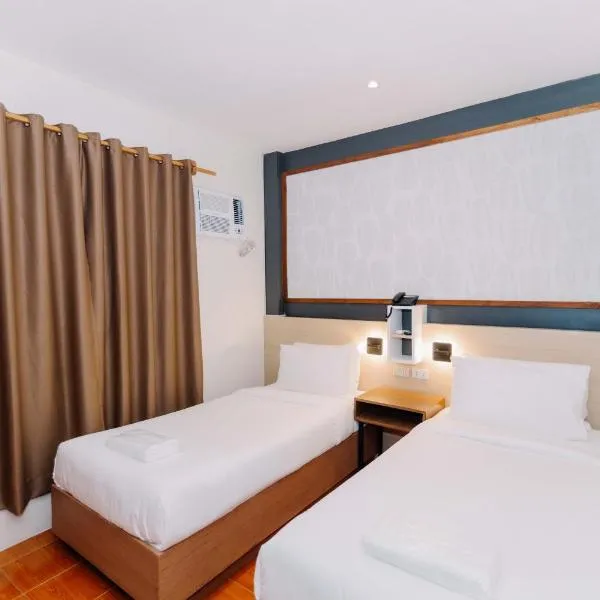 Jovinaj Travellers Inn, hotel en Bula