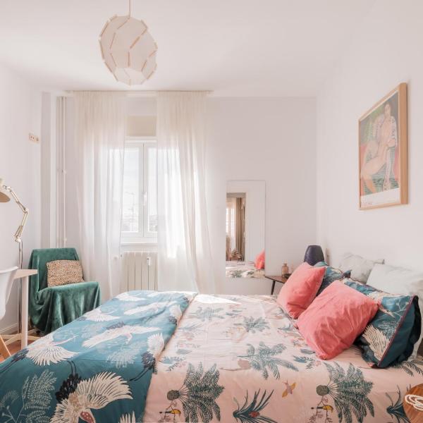 Cozy and Stylish Room with Natural Light and Vibrant Decor, Madrid