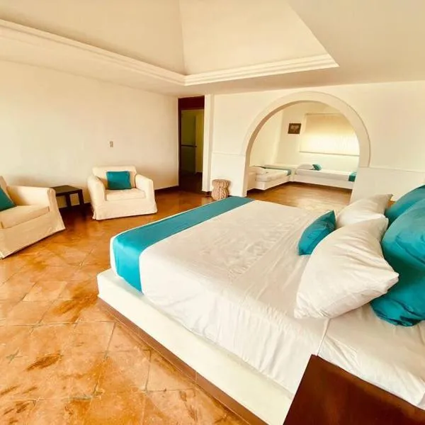 Moderna casa de 3 dormitorios con cama King size y vistas al horizonte de la piscina, hotel in Veracruz