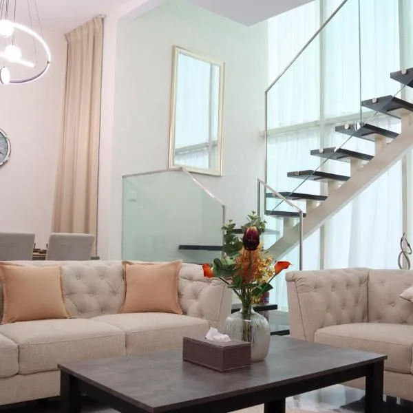 Chalet Blissful - Serene 2BR Duplex Stay in Oasis, Near Masdar Park, hotel in Abu Dhabi