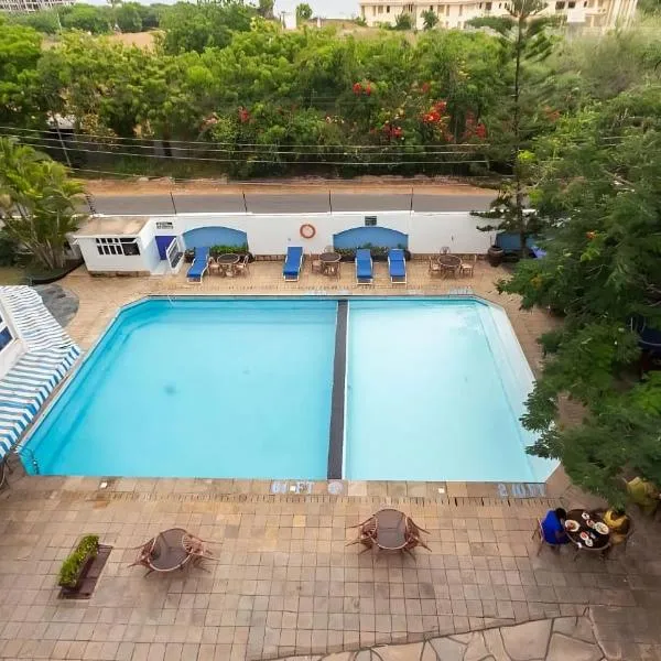 Ocean Blue Retreat-3 minute walk to Nyali Center and 3 minute walk to the Beach, hôtel à Mombasa