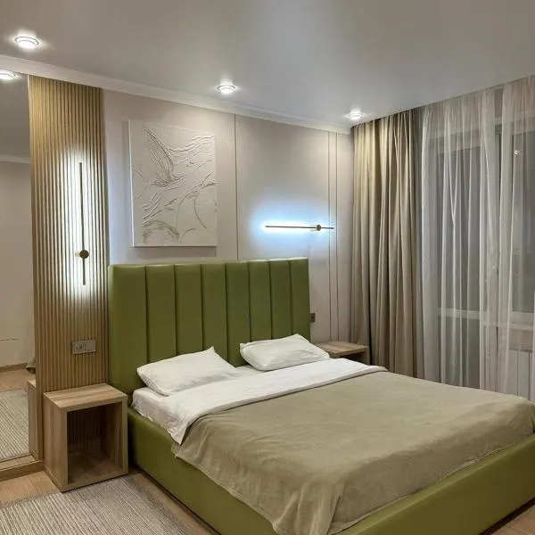 Уютная, новая квартира в центре города, Hotel in Qostanai