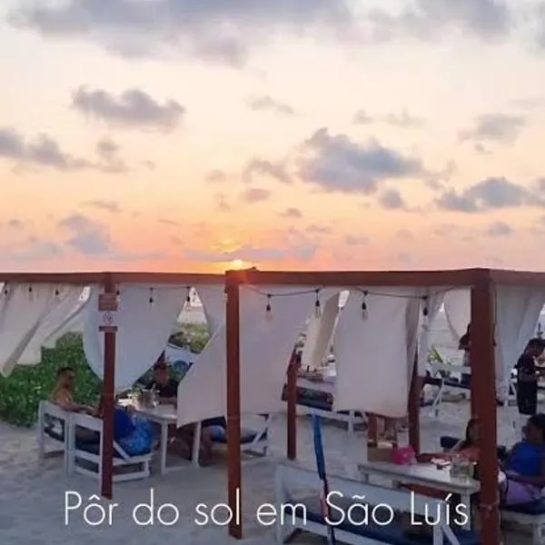 Quarto em AP compartilhado Ponta da areia, hotel in São Luís