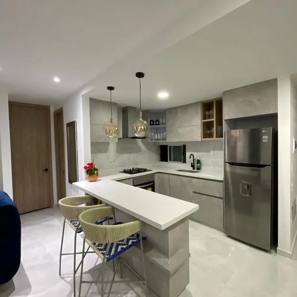 Eleva tu Estadía: Apartamento Moderno con Toques Únicos en la Mejor Ubicación Ibague - Tolima, отель в городе Ибаге