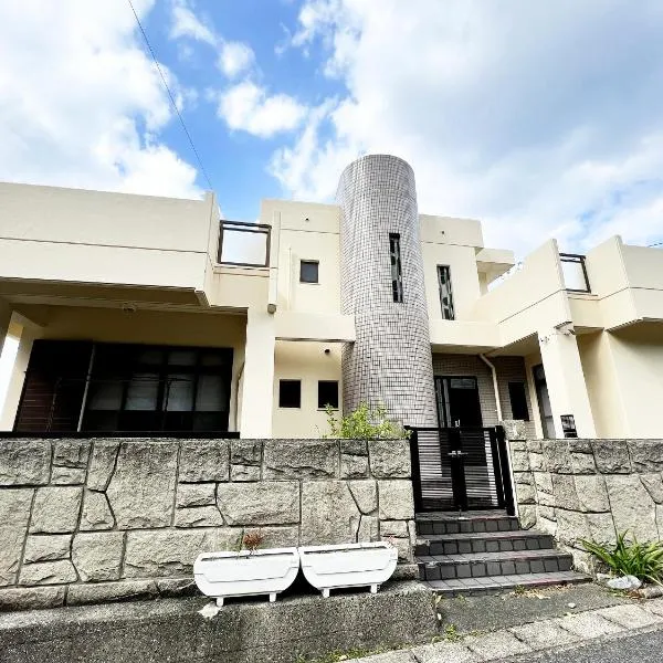 秘境の楽園 Cocos Harbor 奄美, hotel en Yamato