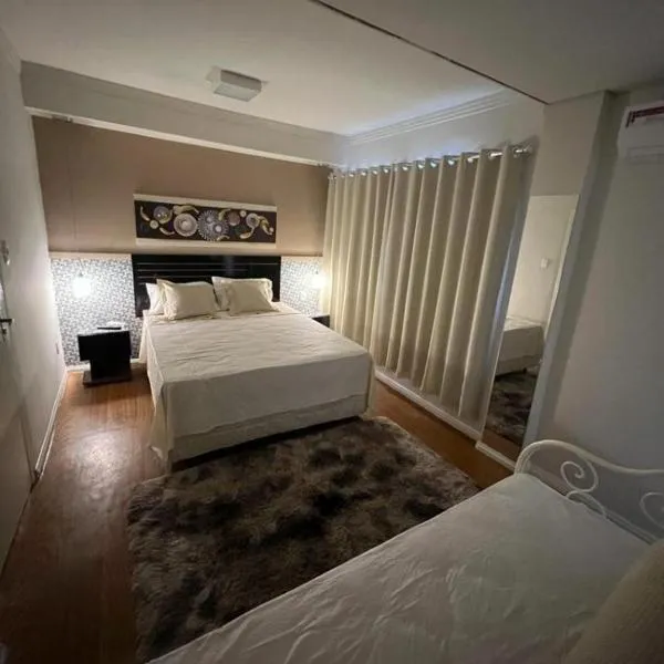 SUITE 12 em POUSADA CRISTAIS DO VALE para Casal e 2 solteiros, Hotel in Teófilo Otoni