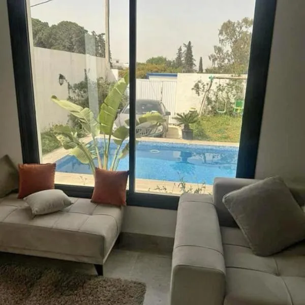 Coquette villa avec piscine, Hotel in Tunis