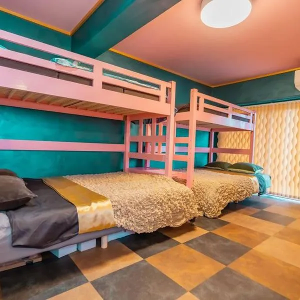 シートピア恩納村 徒歩3分でビーチへ 6名宿泊可能 空港直通バス停目前で便利, Hotel in Fujaku